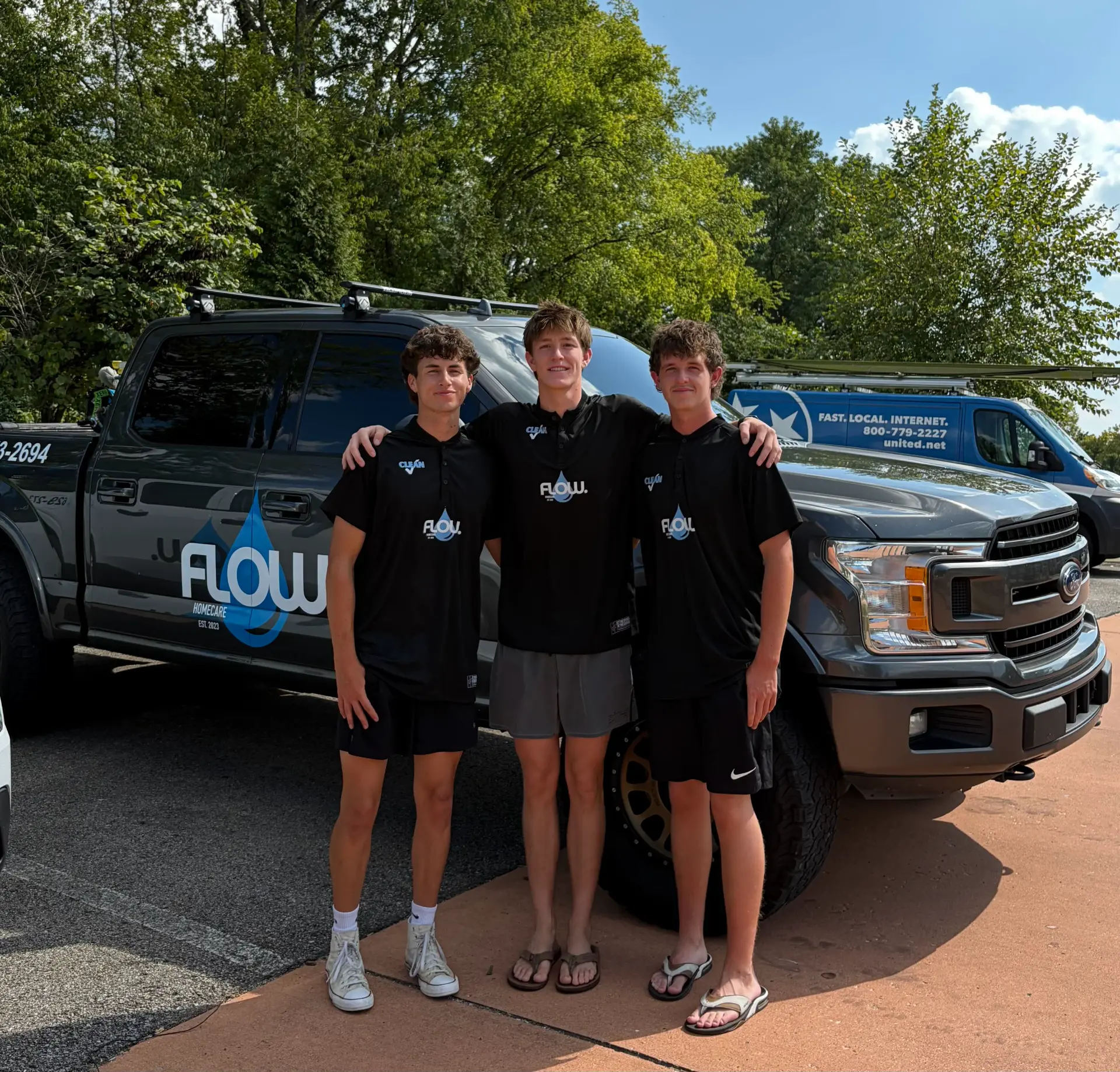 The Flow HomeCare team in front of their service truck